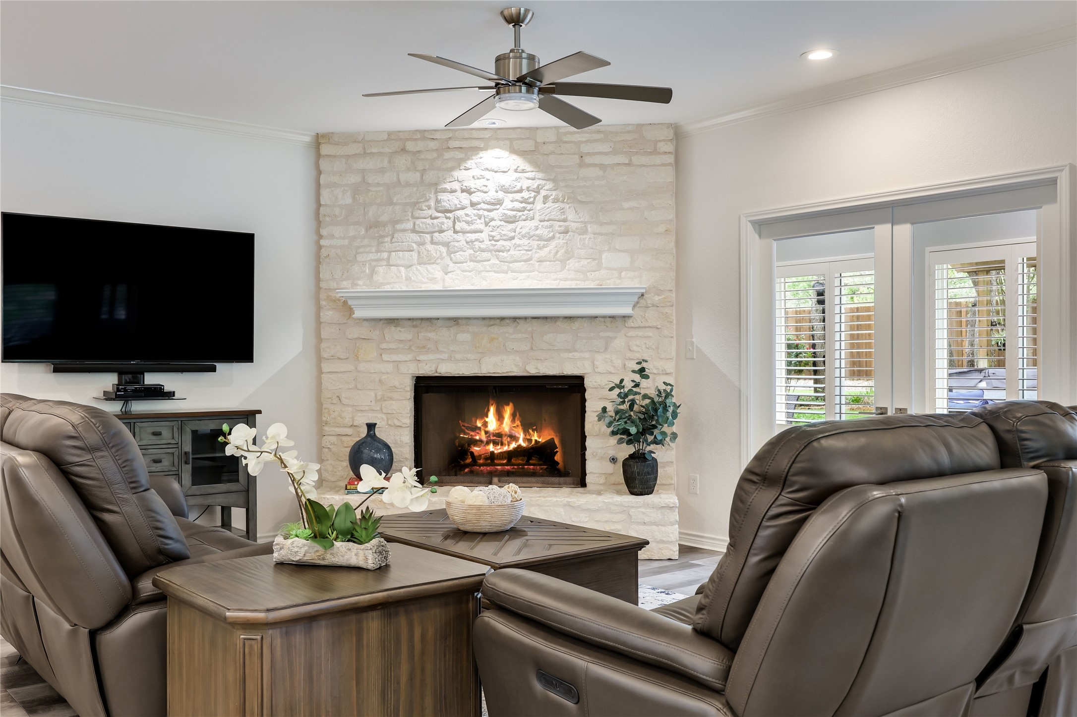 906 Texas Trail Austin, TX 78737 - Photo 3 of 26 a living room with furniture and a fireplace