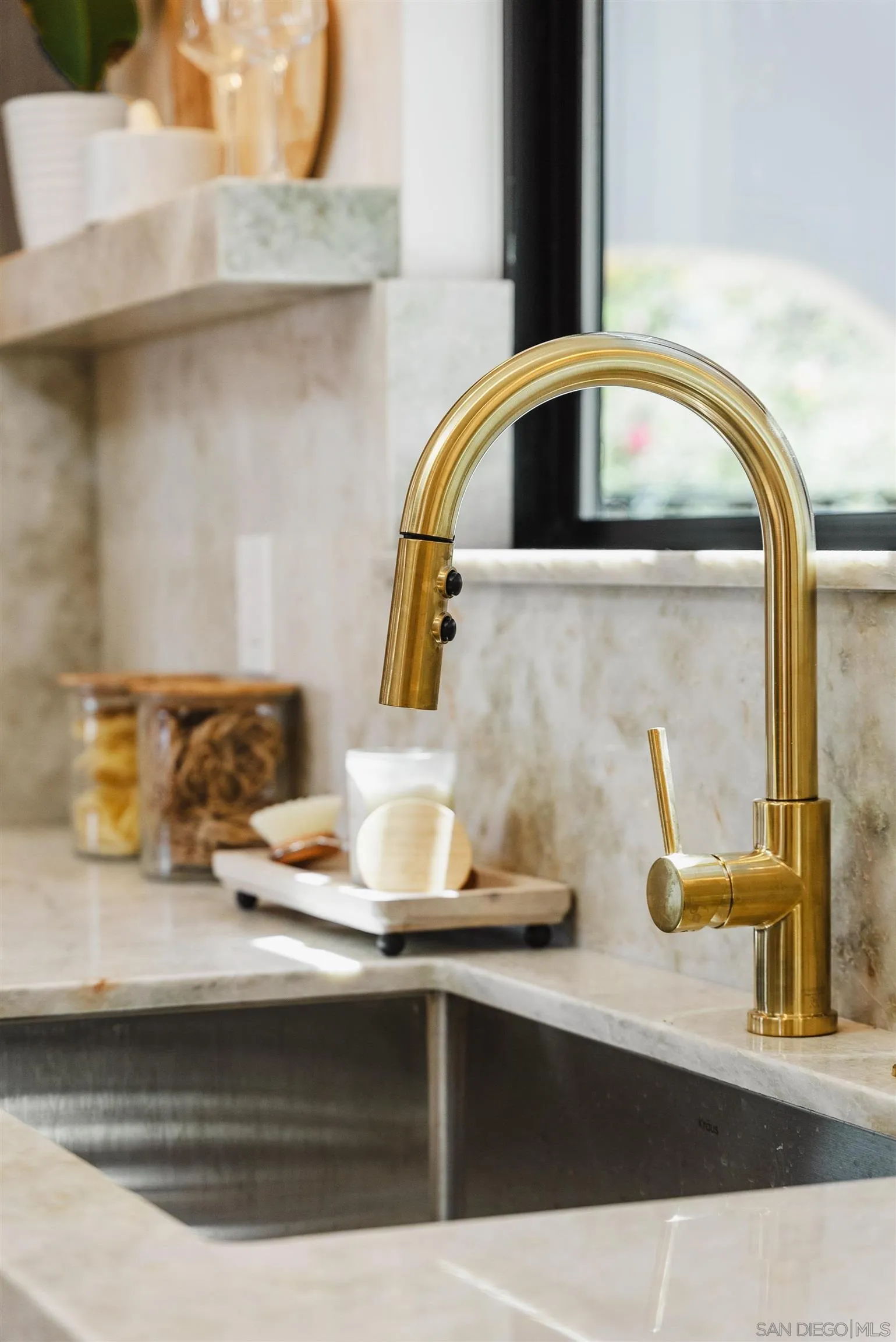1262 Horizon Ridge El Cajon, CA 92020 - Photo 16 of 68 a kitchen with a sink and a wooden floor