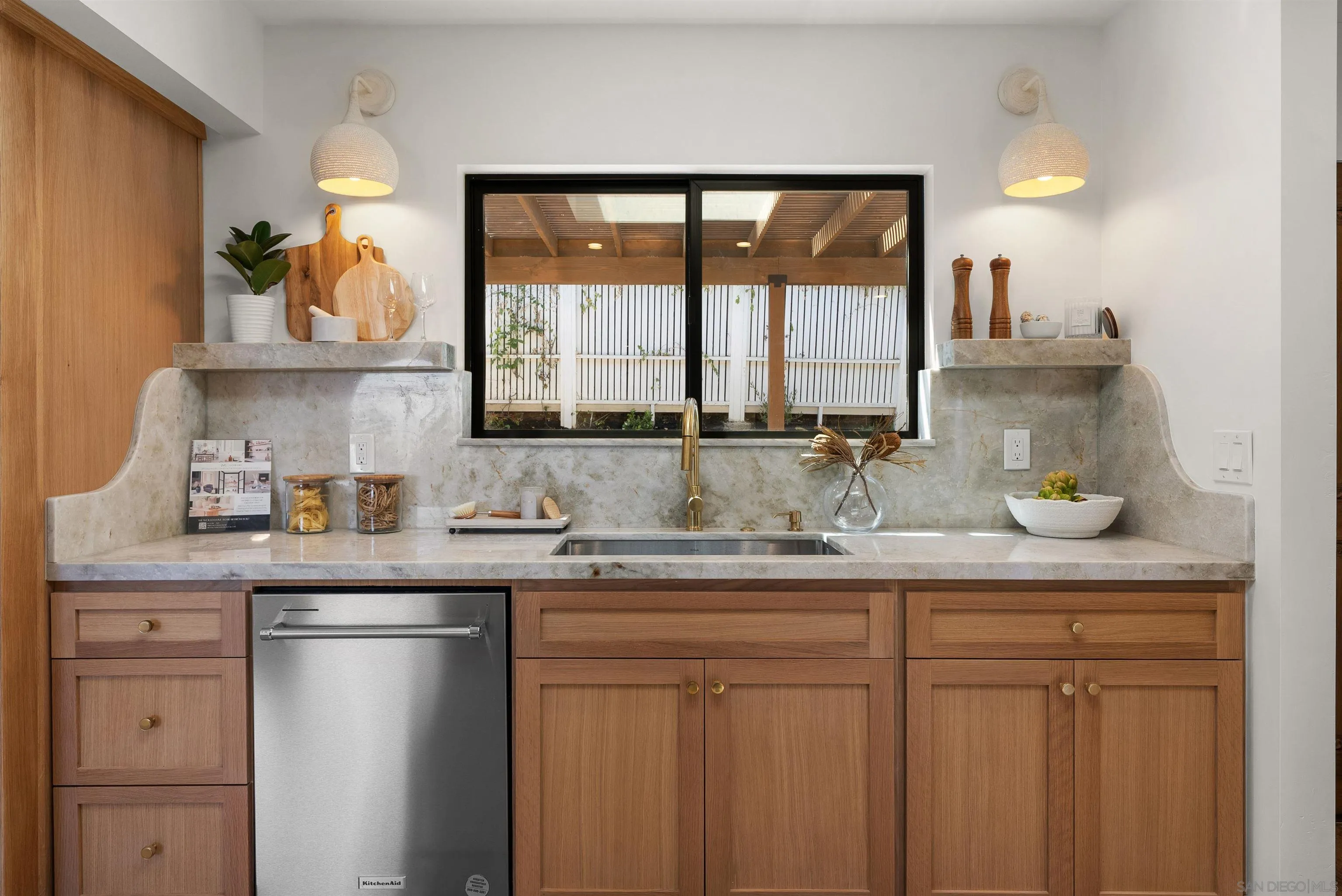 1262 Horizon Ridge El Cajon, CA 92020 - Photo 17 of 68 a kitchen with white cabinets and a window