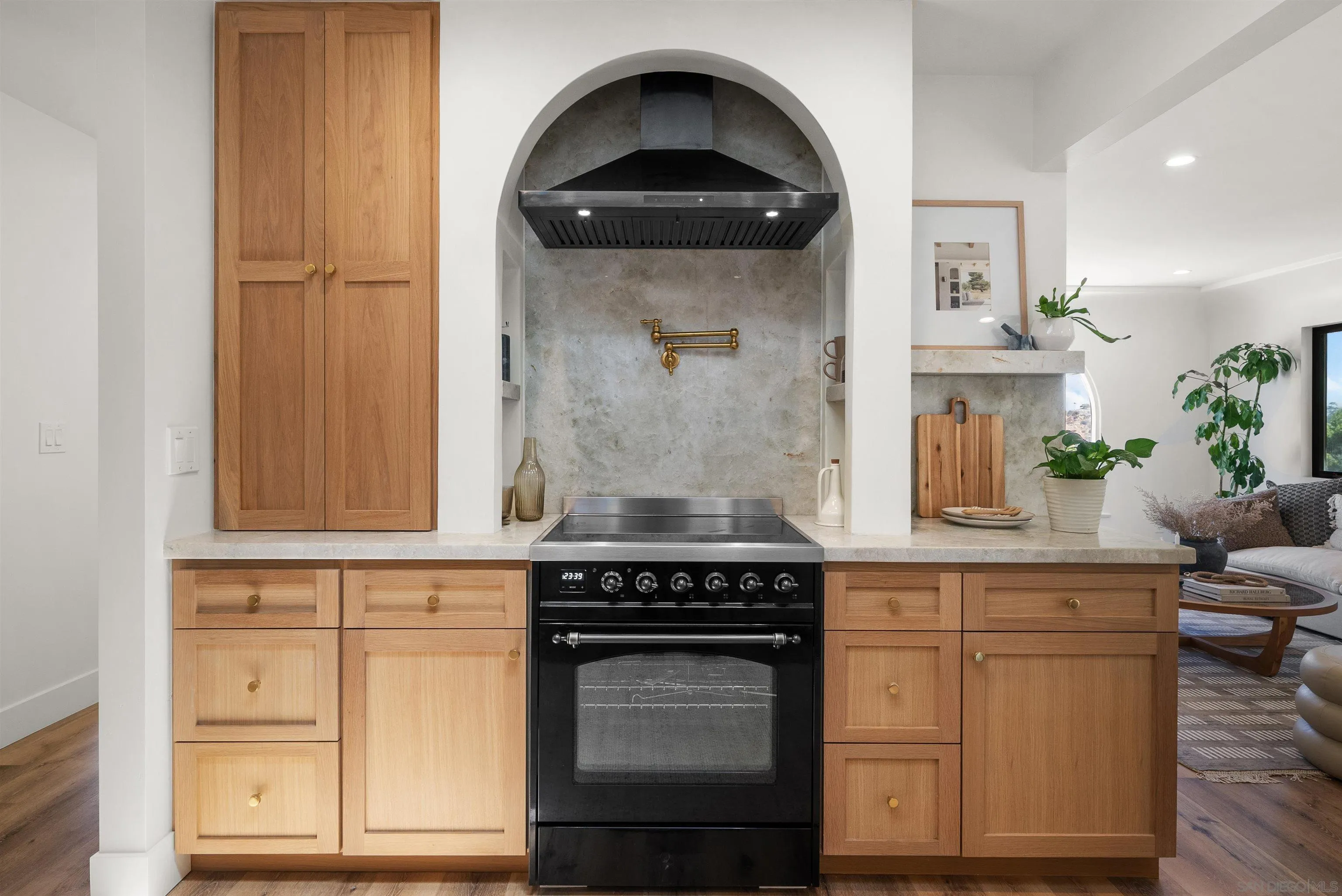1262 Horizon Ridge El Cajon, CA 92020 - Photo 19 of 68 a kitchen with granite countertop white cabinets and a stove