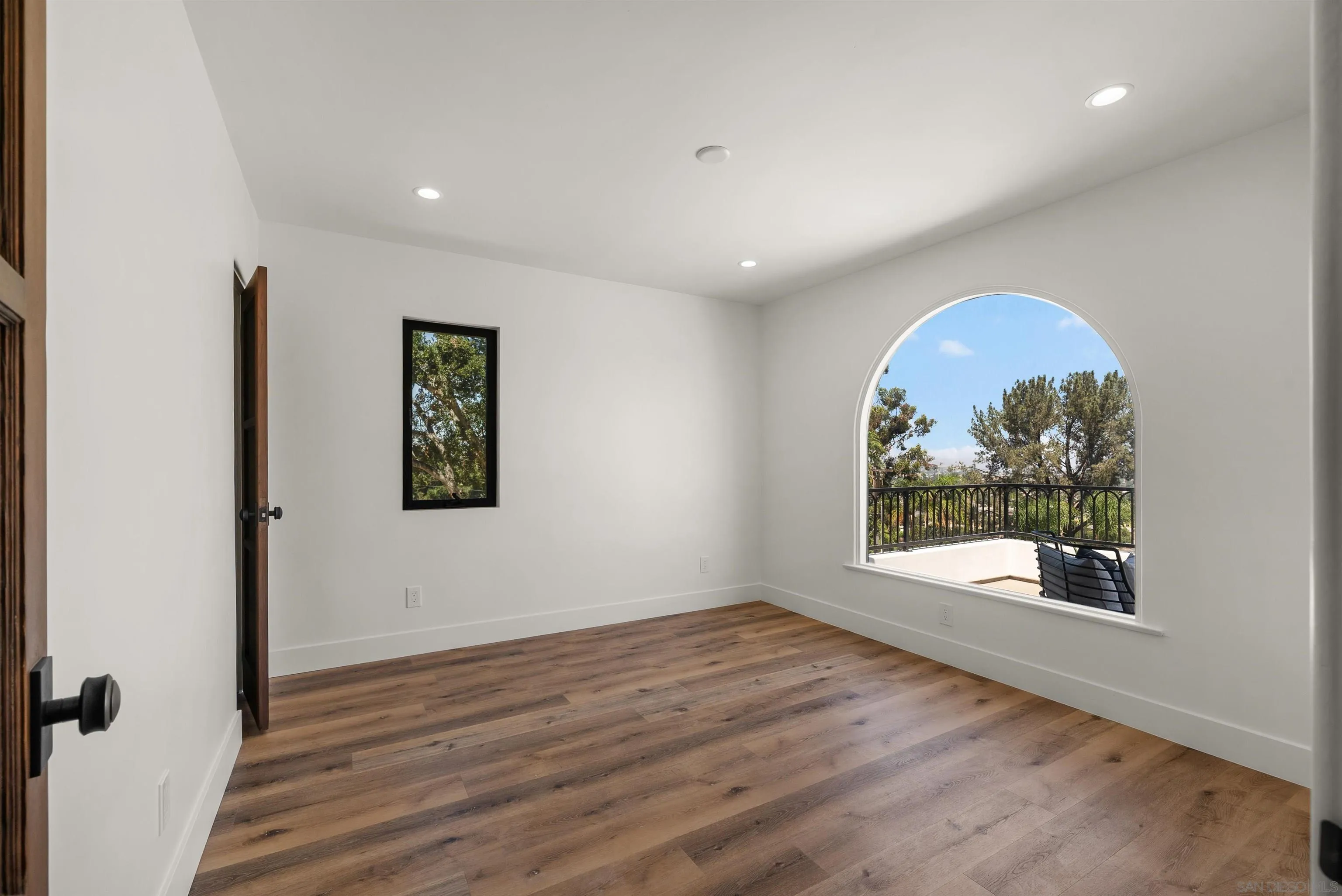 1262 Horizon Ridge El Cajon, CA 92020 - Photo 26 of 68 an empty room with wooden floor and window
