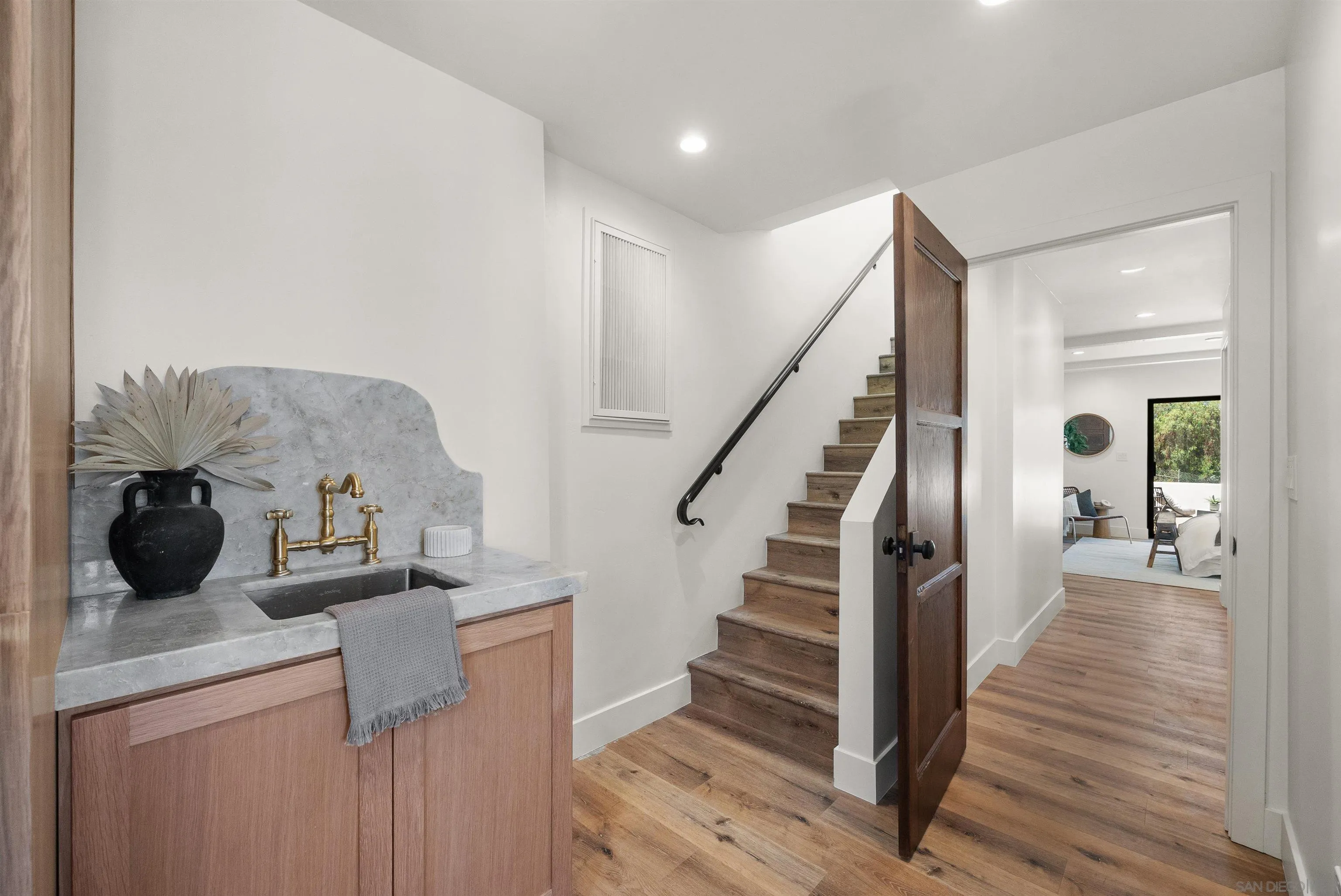 1262 Horizon Ridge El Cajon, CA 92020 - Photo 28 of 68 a view of entryway and hall with wooden floor