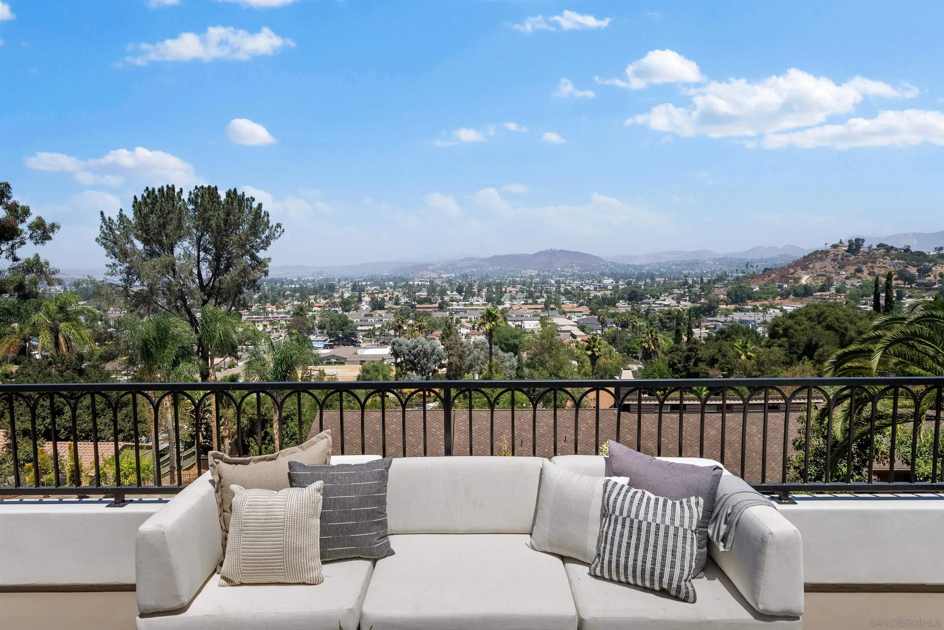 1262 Horizon Ridge El Cajon, CA 92020 - Photo 41 of 68 a balcony with wooden floor and city view