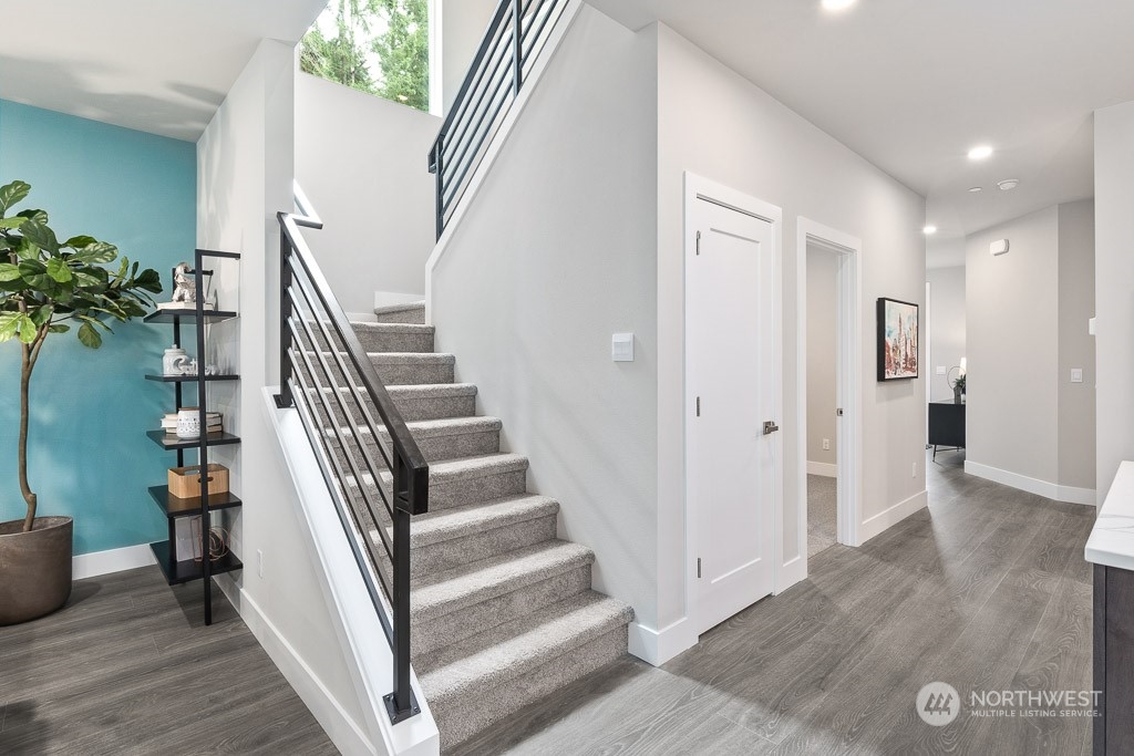 22829 20th Place West Bothell, WA 98021 - Photo 16 of 31 a view of entryway with wooden floor and stairs