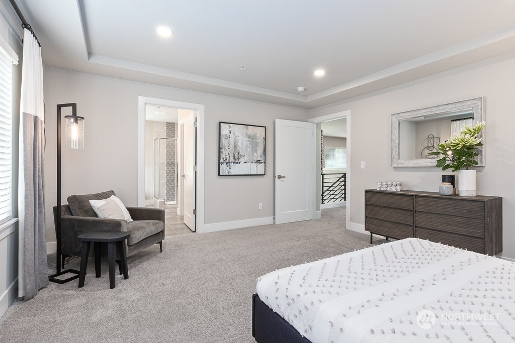 22829 20th Place West Bothell, WA 98021 - Photo 21 of 31 a bedroom with a bed and a dresser
