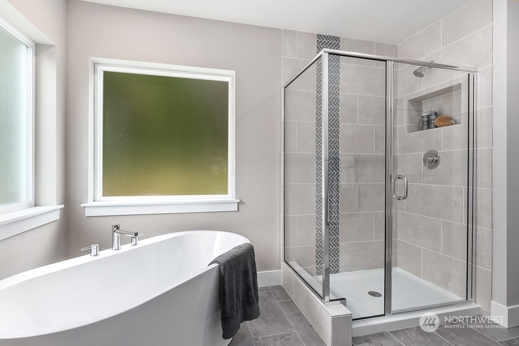 22829 20th Place West Bothell, WA 98021 - Photo 22 of 31 a bathroom with a bathtub and a shower