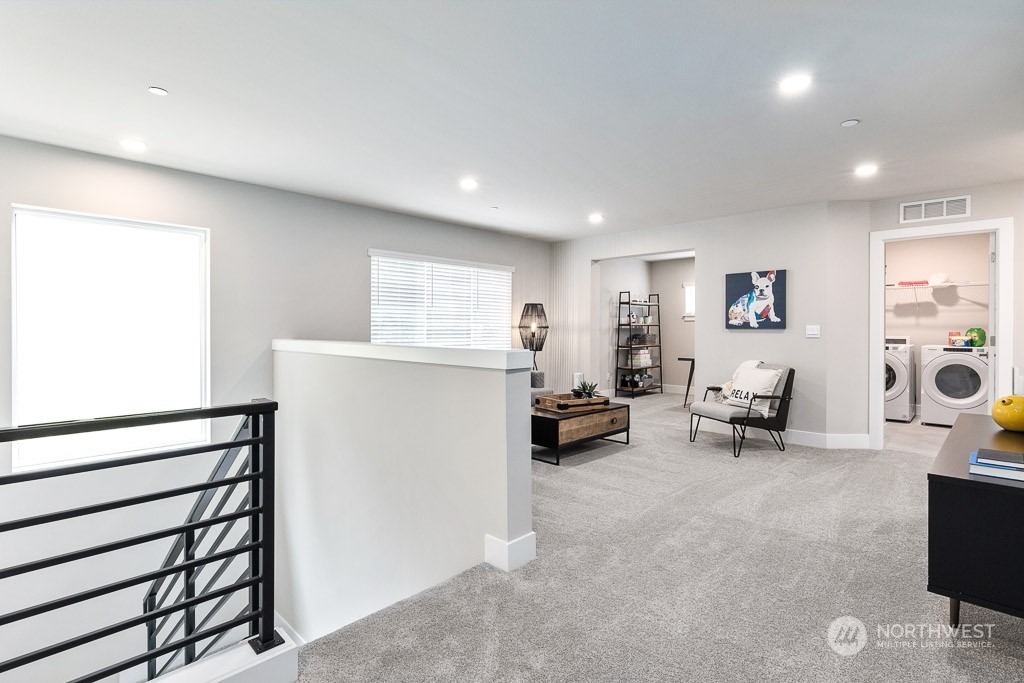 22829 20th Place West Bothell, WA 98021 - Photo 23 of 31 a living room with furniture and a lamp