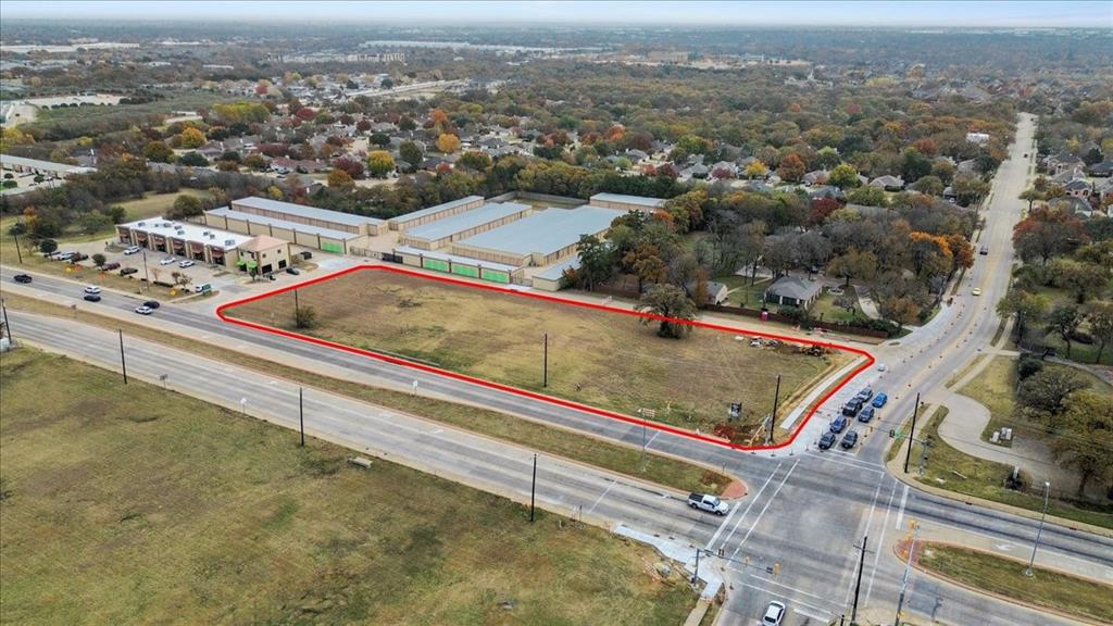 1401 Farm To Market Road 1187 Mansfield, TX 76063 - Photo 2 of 8 an aerial view of residential houses with outdoor space