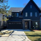 a view of a house with a swimming pool