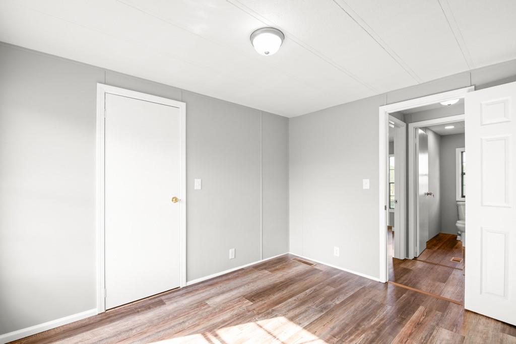 710 Athens Road Lexington, GA 30648 - Photo 12 of 17 a view of a room with wooden floor