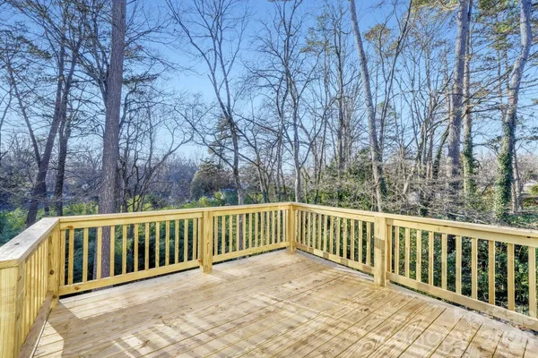 a view of a wooden roof deck