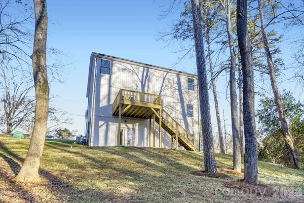 a view of backyard with green space
