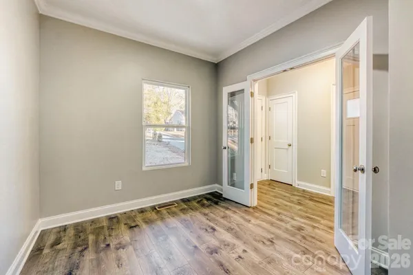 a view of an empty room and window