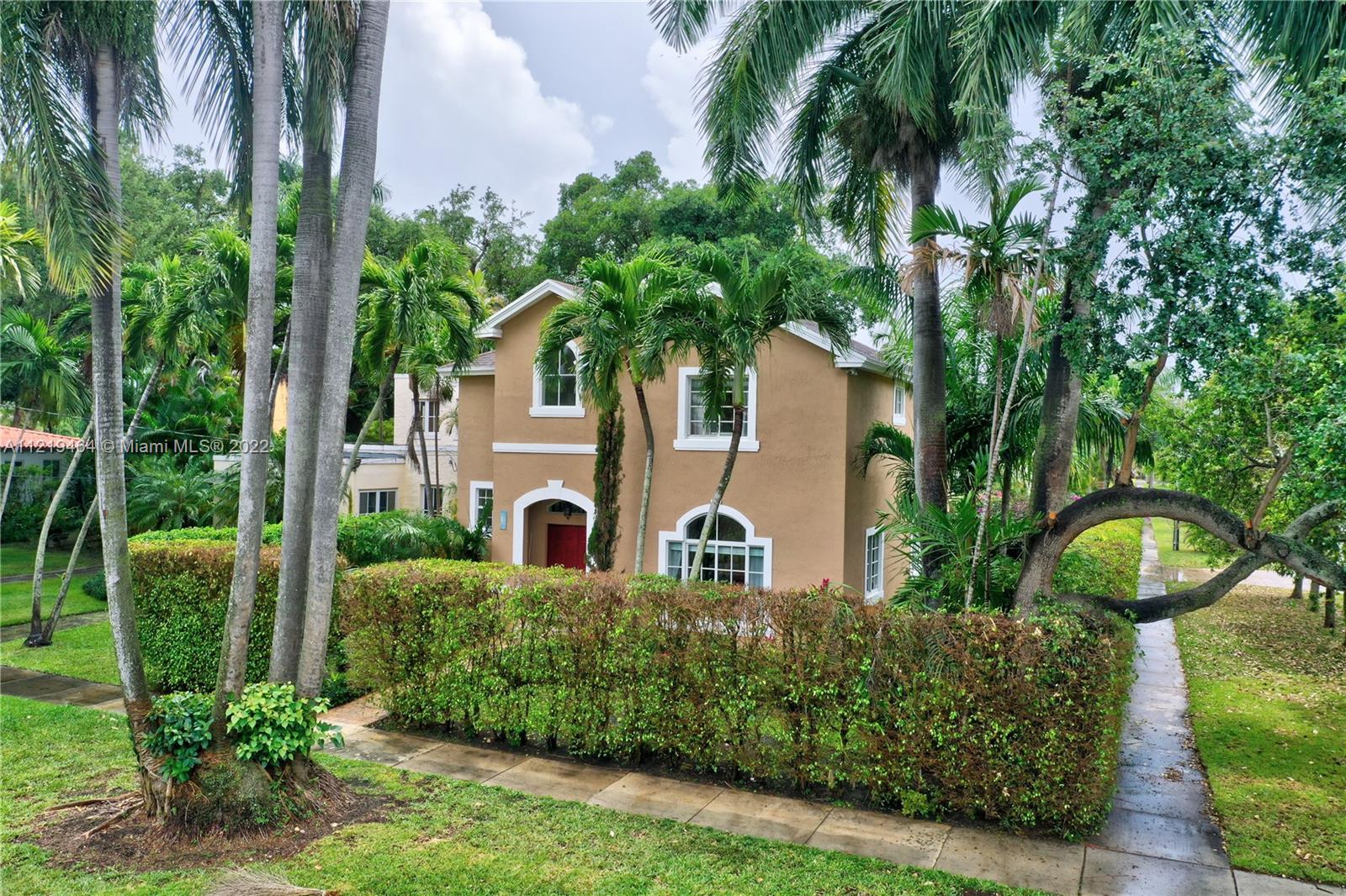 190 Southwest 21st Road Miami, FL 33129 - Photo 54 of 69 a view of a house with a tree and plants
