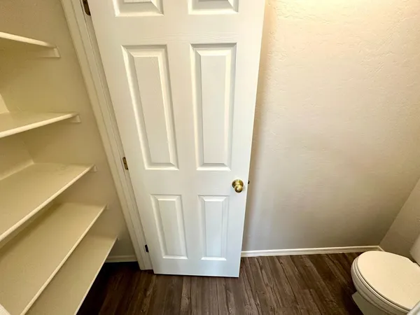 a bathroom with a sink and toilet
