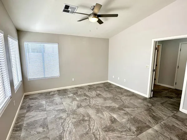 a view of an empty room and window