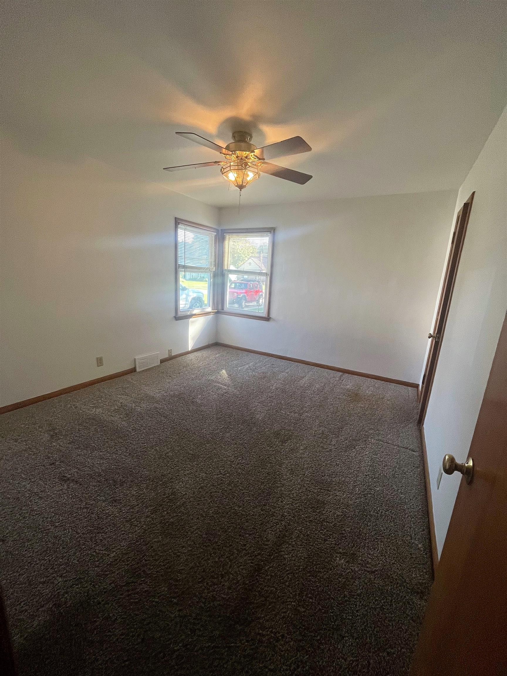 4026 Pinecrest Road Rockford, IL 61107 - Photo 12 of 27 a view of empty room with window