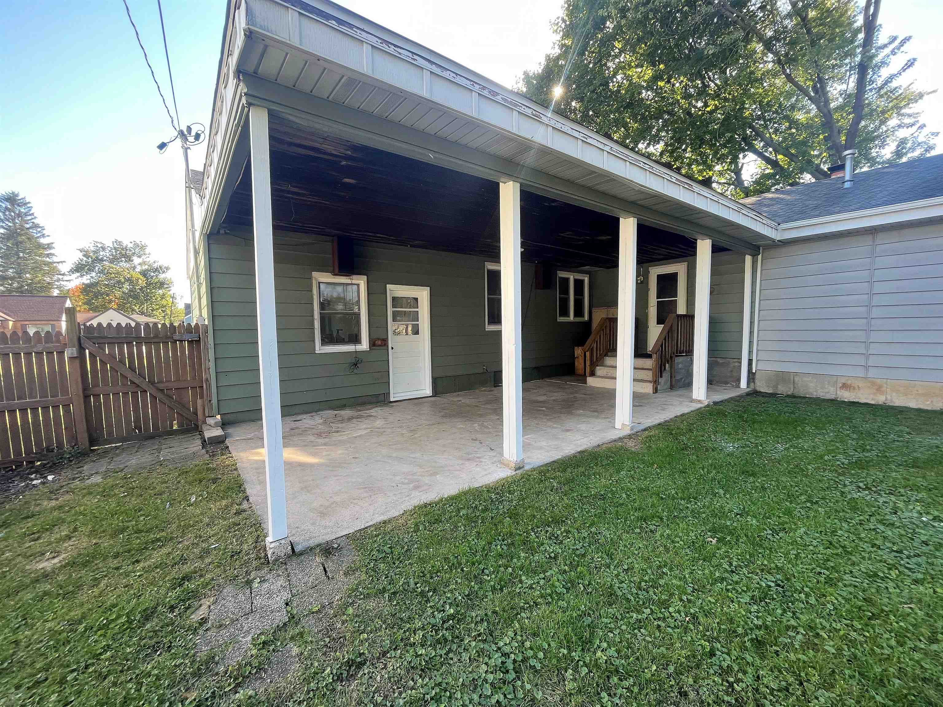 4026 Pinecrest Road Rockford, IL 61107 - Photo 25 of 27 a view of a porch with a backyard