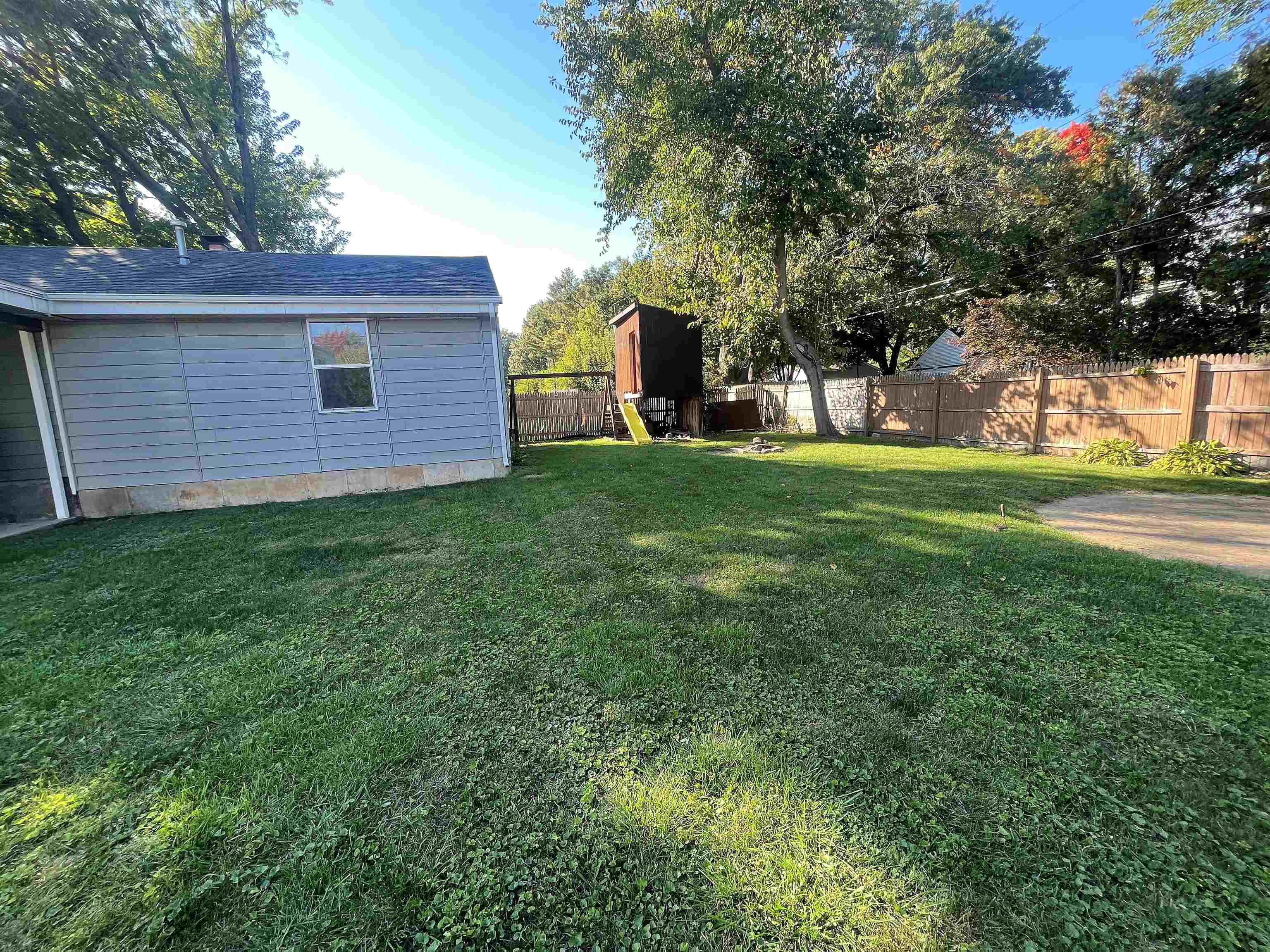 4026 Pinecrest Road Rockford, IL 61107 - Photo 27 of 27 a view of a backyard with large trees