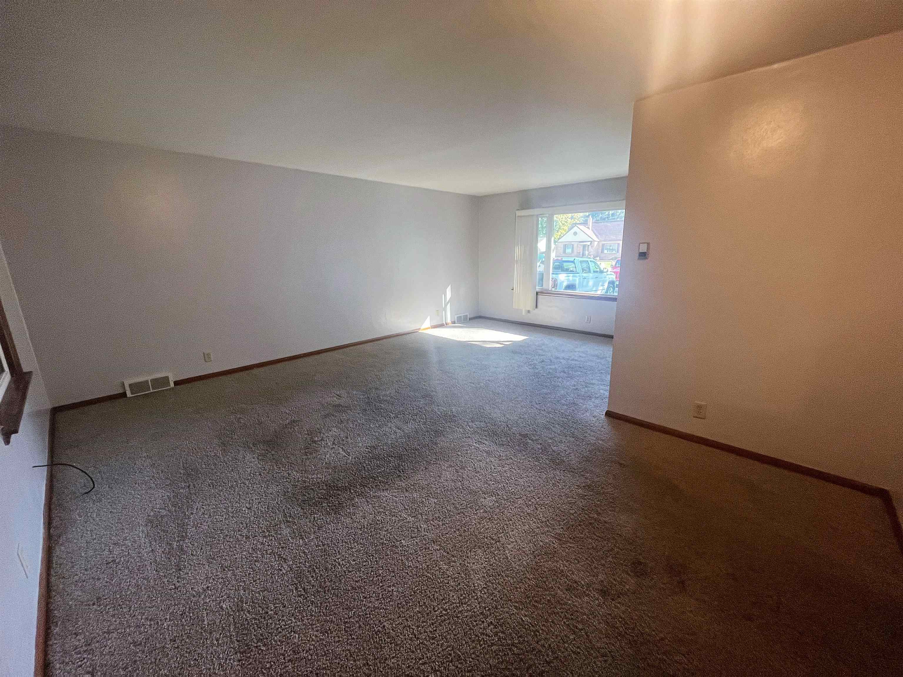 4026 Pinecrest Road Rockford, IL 61107 - Photo 5 of 27 an empty room with windows
