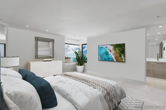 a bedroom with a bed and a painting on the wall