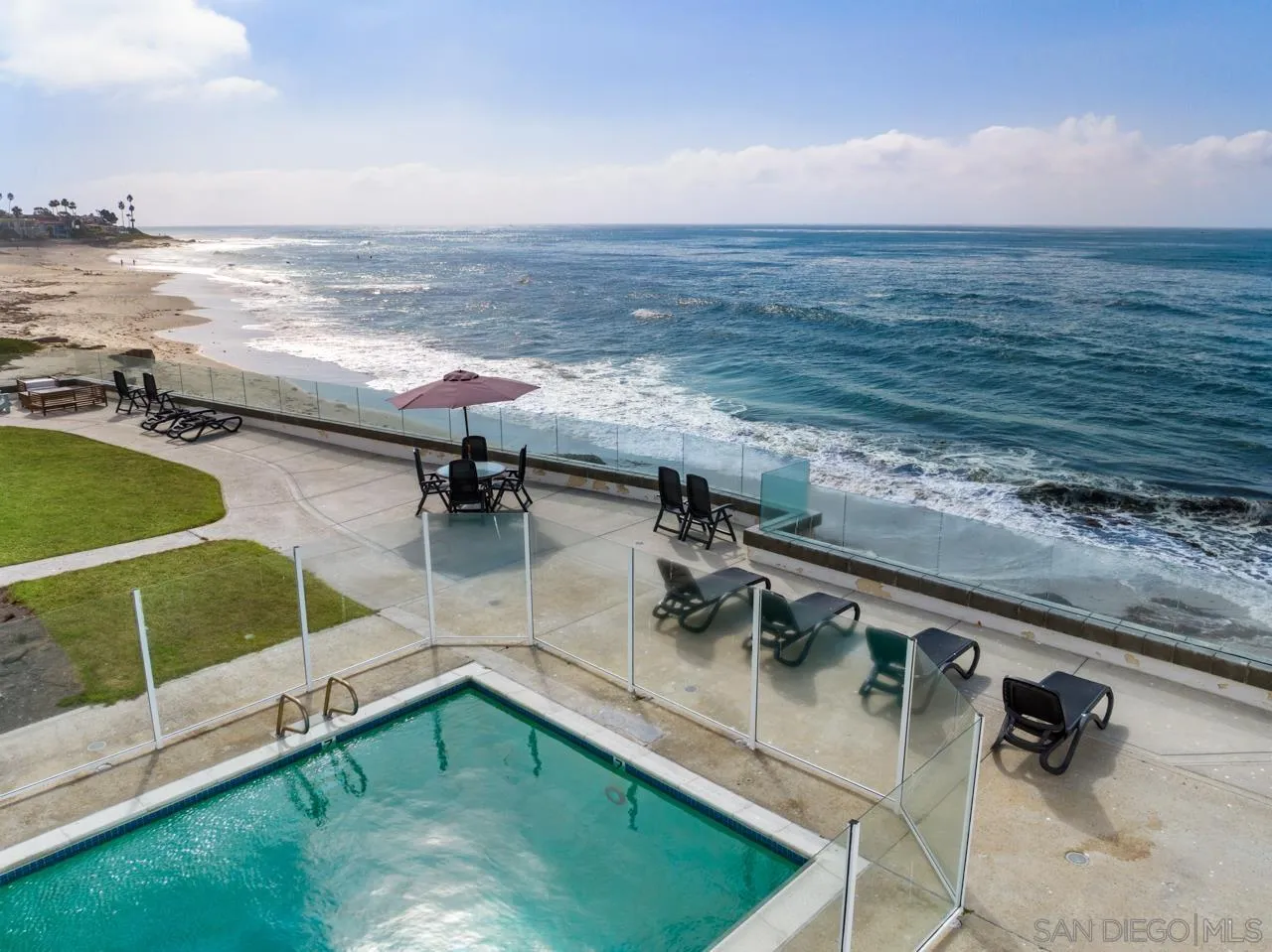 100 Coast Boulevard, Unit 308 La Jolla, CA 92037 - Photo 17 of 40 a view of a swimming pool with an ocean view