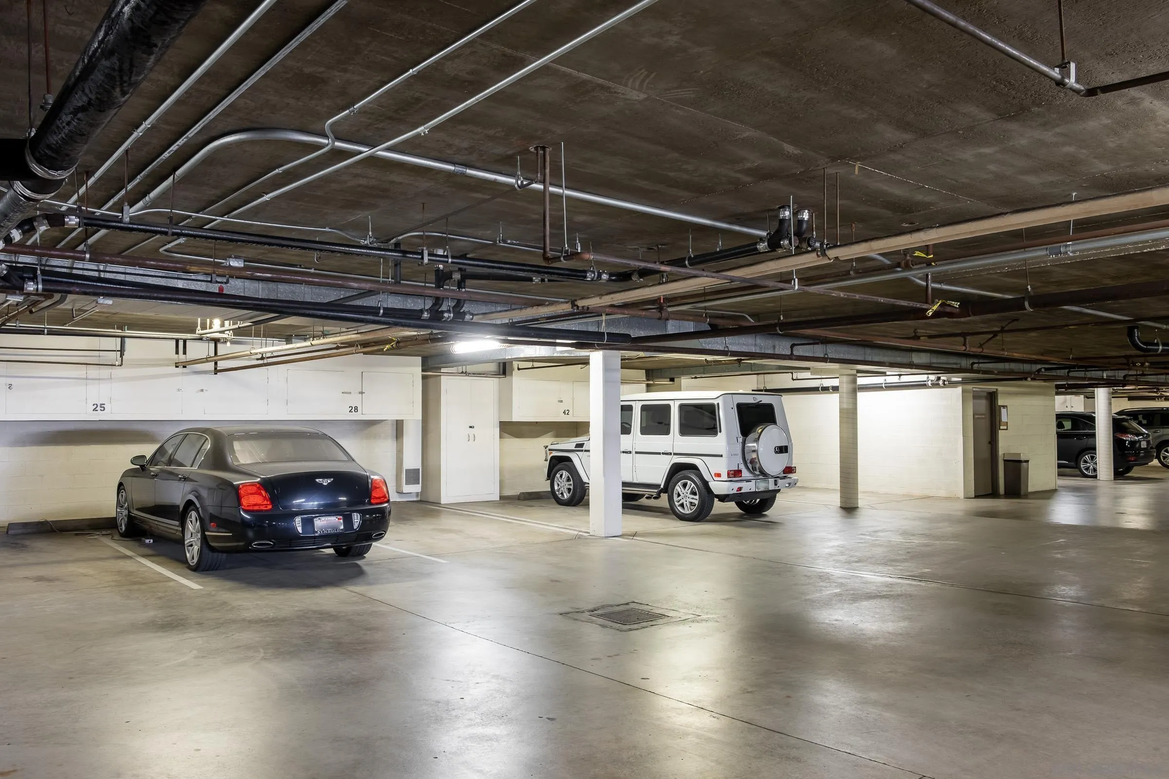 100 Coast Boulevard, Unit 308 La Jolla, CA 92037 - Photo 39 of 40 a view of parking garage with cars parked