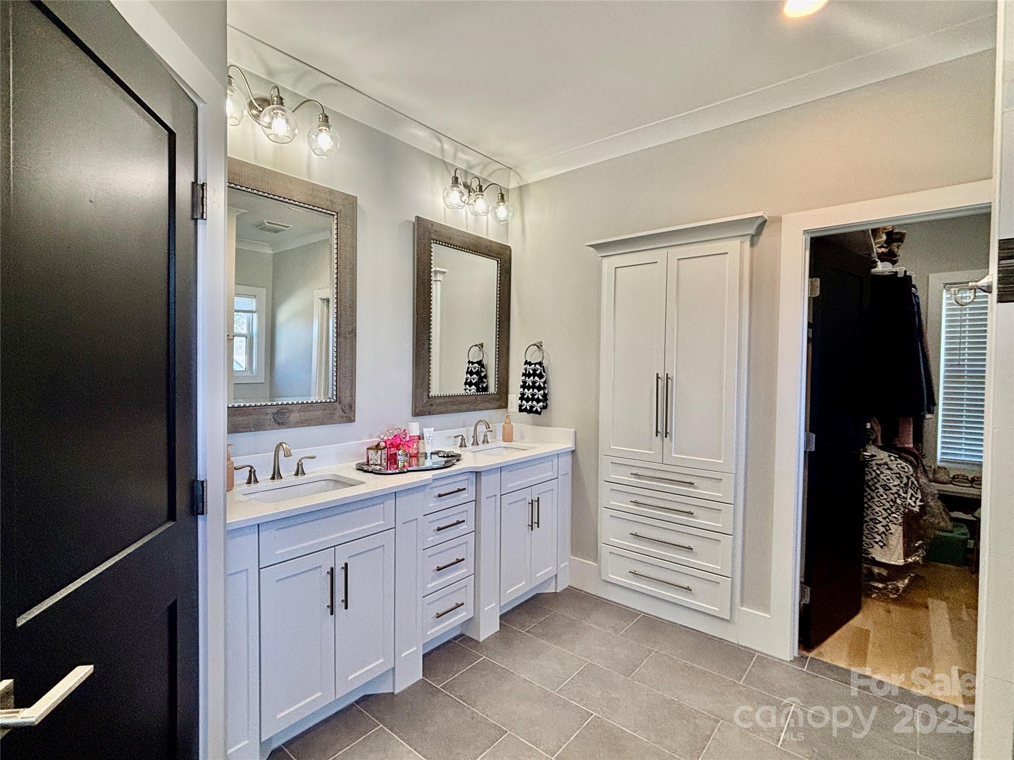 108 41st Avenue Northwest Hickory, NC 28601 - Photo 23 of 48 a bathroom with a sink and a mirror