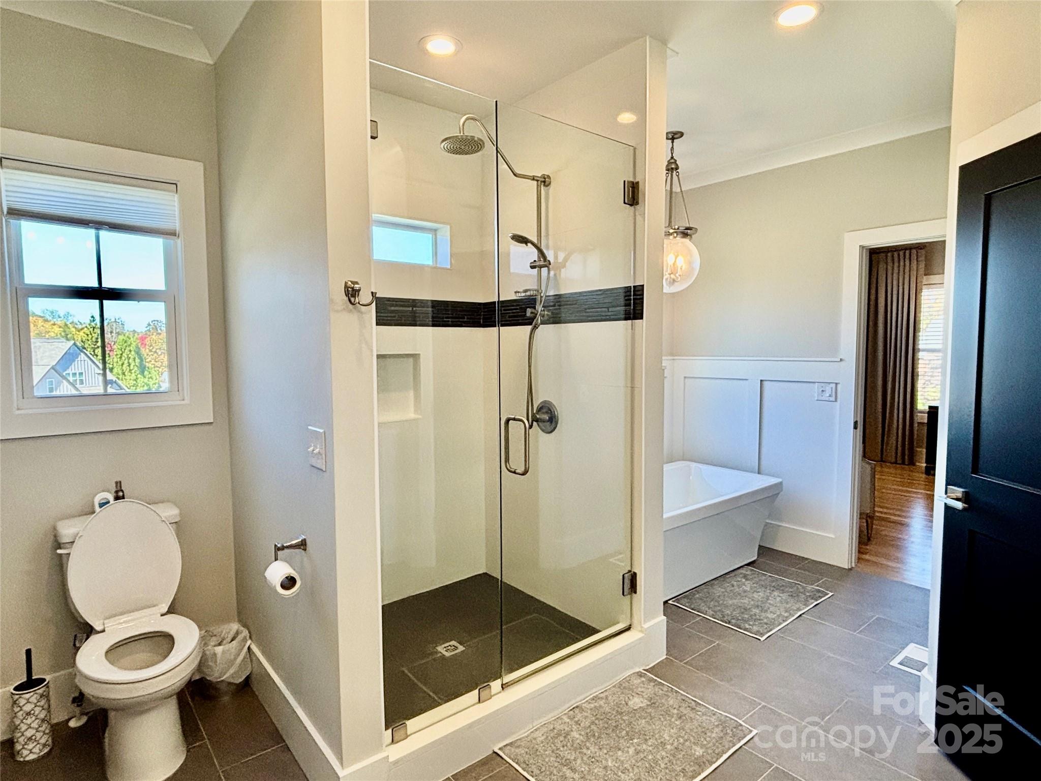 108 41st Avenue Northwest Hickory, NC 28601 - Photo 24 of 48 a bathroom with a shower and a toilet