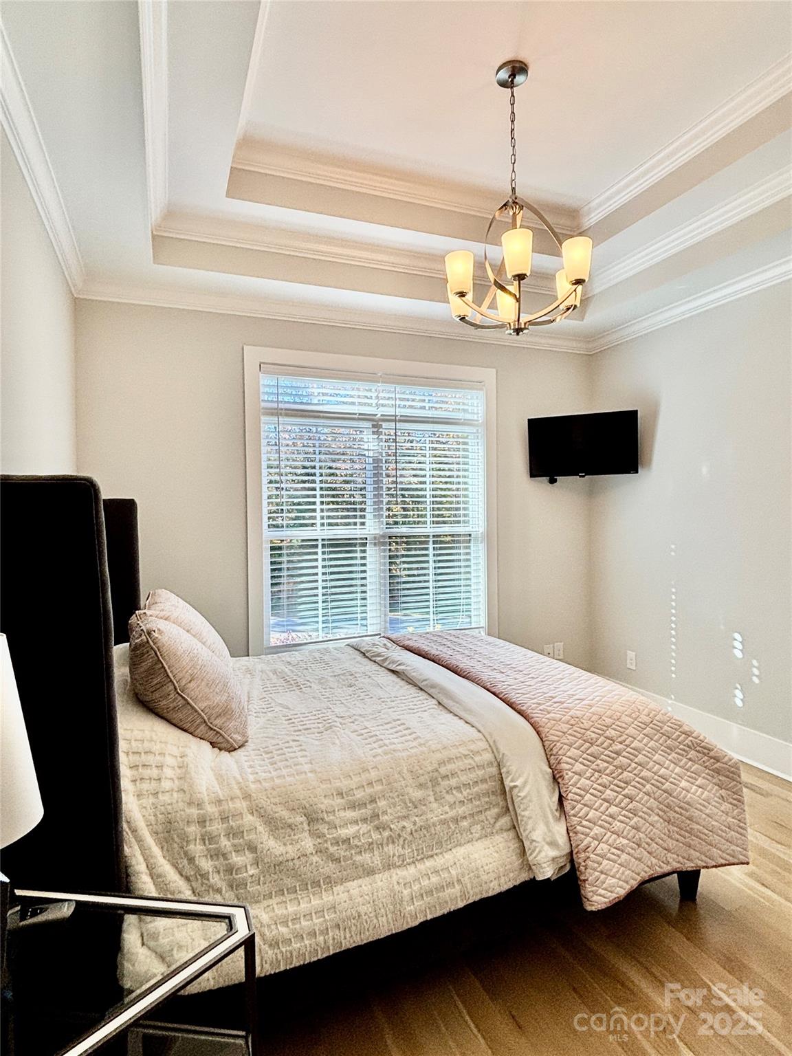 108 41st Avenue Northwest Hickory, NC 28601 - Photo 25 of 48 a bedroom with a bed ceiling fan and a window
