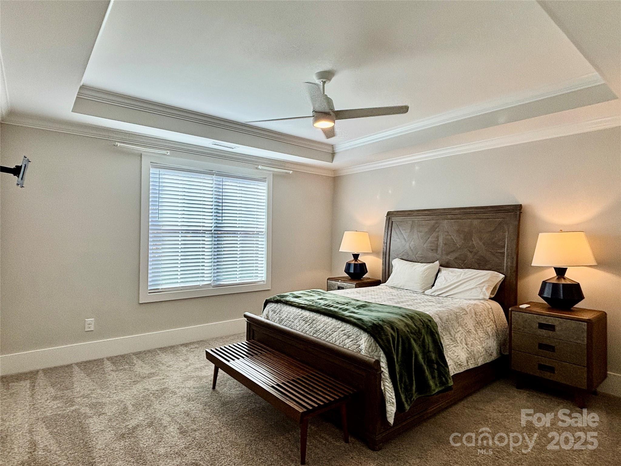 108 41st Avenue Northwest Hickory, NC 28601 - Photo 38 of 48 a bedroom with a bed two lamps and a window