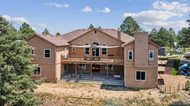 a front view of a house with yard