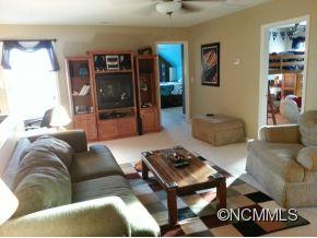 182 Pamlico Road Fletcher, NC 28732 - Photo 7 of 11 a living room with furniture and a flat screen tv