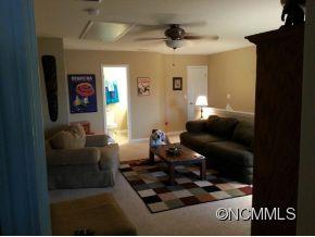 182 Pamlico Road Fletcher, NC 28732 - Photo 10 of 11 a living room with furniture and a potted plant