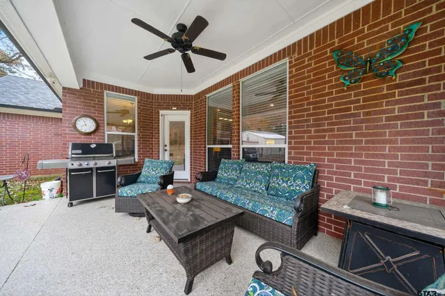 a open kitchen with stainless steel appliances granite countertop a stove and a sink