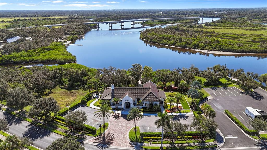 1632 Rio Vista Terrace Parrish, FL 34219 - Photo 30 of 34 an aerial view of a house with a lake view