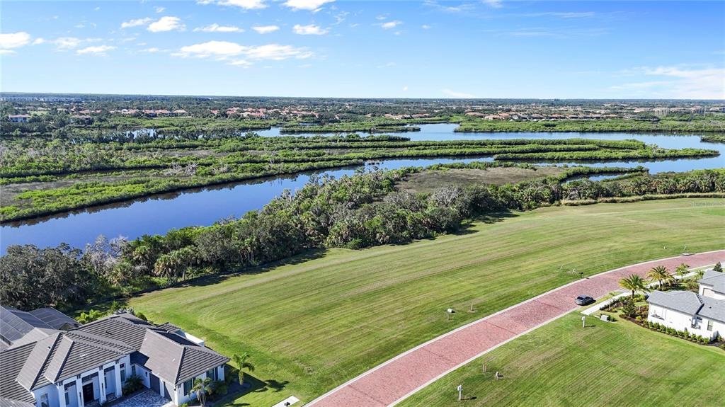 1632 Rio Vista Terrace Parrish, FL 34219 - Photo 4 of 34 a view of a city with mountains in the background
