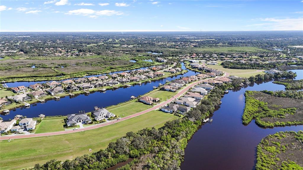 1632 Rio Vista Terrace Parrish, FL 34219 - Photo 9 of 34 an aerial view of a residential houses and outdoor space