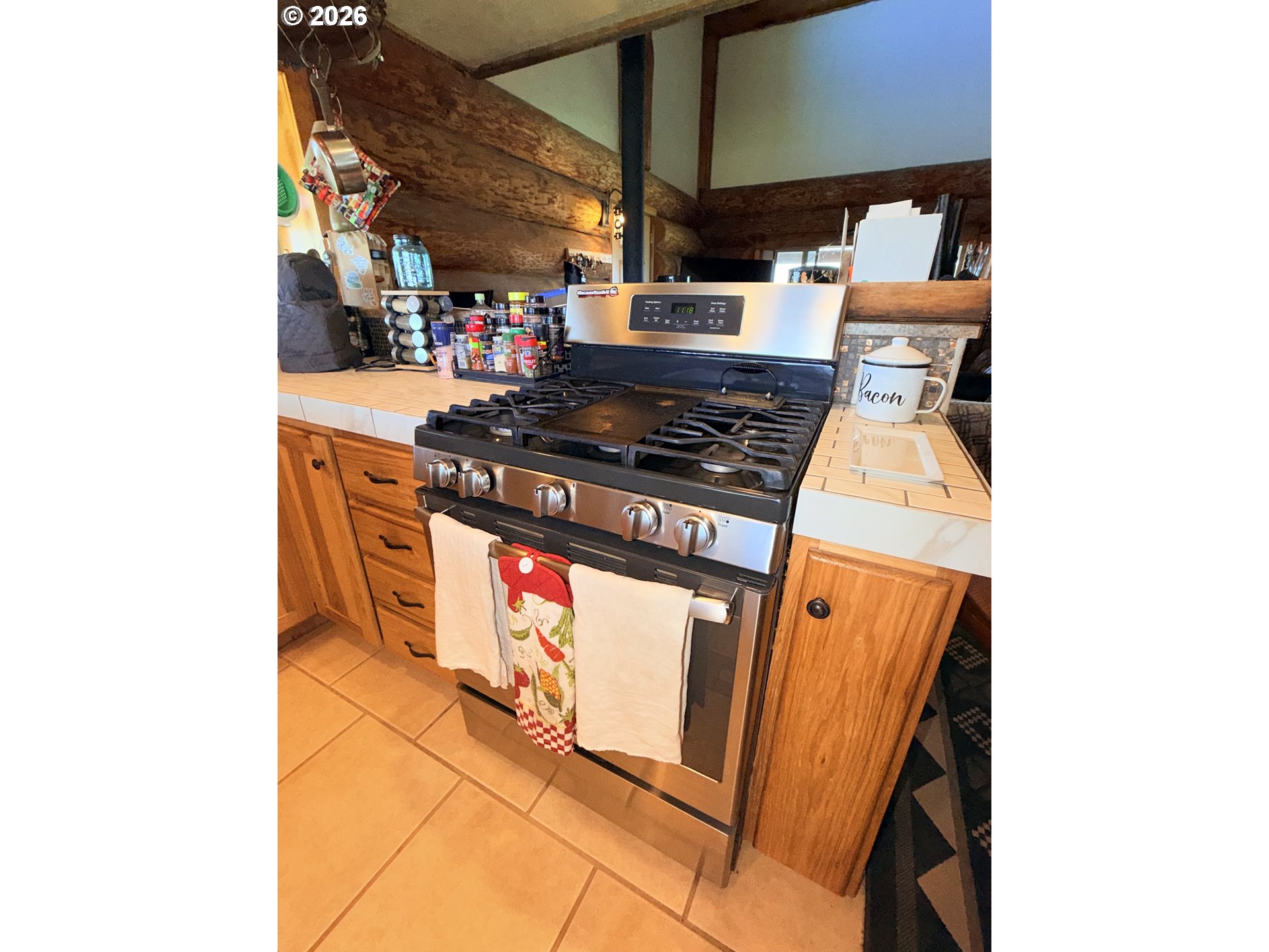 92586 Water Users Lane Lakeview, OR 97630 - Photo 14 of 36 a kitchen with stainless steel appliances granite countertop a stove and a microwave