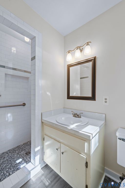 11210 Celtic Road Chesterfield, VA 23838 - Photo 20 of 39 a bathroom with a sink vanity and mirror