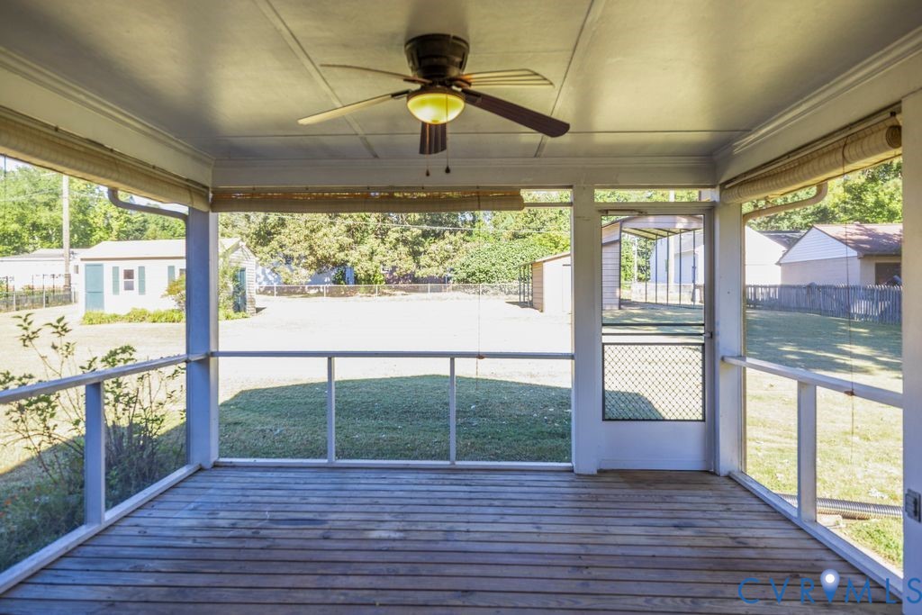 11210 Celtic Road Chesterfield, VA 23838 - Photo 23 of 39 a view of empty room with wooden floor and floor to ceiling window