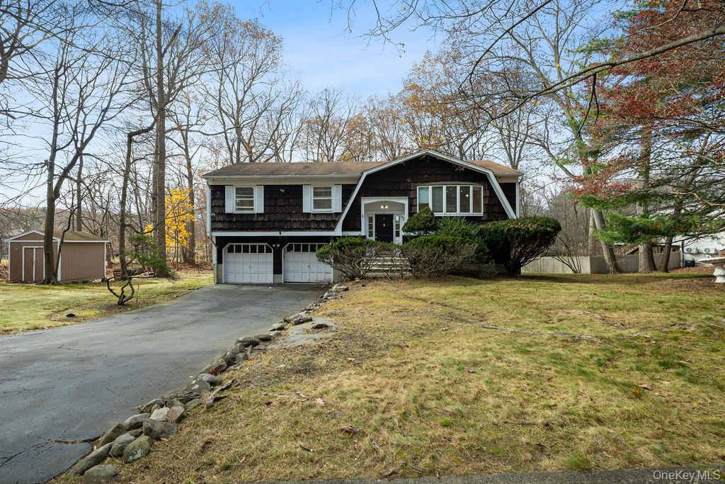 9 New Ackertown Road Monsey, NY 10952 - Photo 1 of 37 a front view of a house with a yard