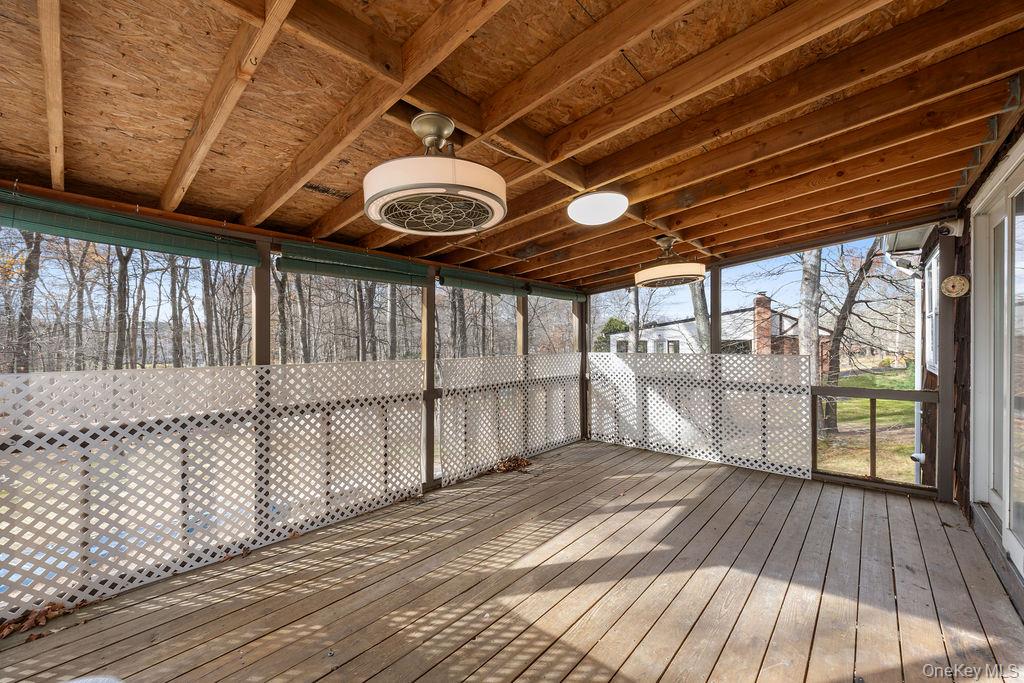 9 New Ackertown Road Monsey, NY 10952 - Photo 14 of 37 a view of a porch with wooden floor