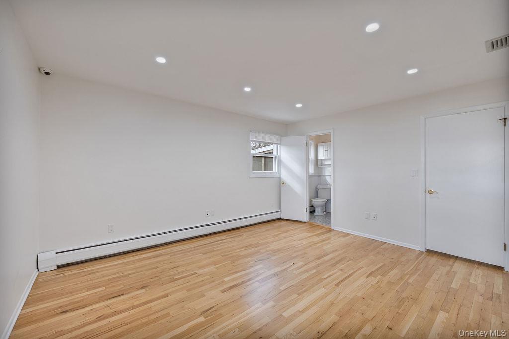9 New Ackertown Road Monsey, NY 10952 - Photo 17 of 37 a view of empty room with wooden floor