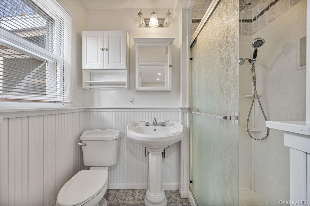 9 New Ackertown Road Monsey, NY 10952 - Photo 19 of 37 a bathroom with a sink toilet and a mirror