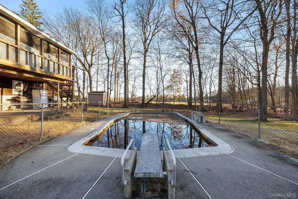 9 New Ackertown Road Monsey, NY 10952 - Photo 30 of 37 a view of a swimming pool with a patio