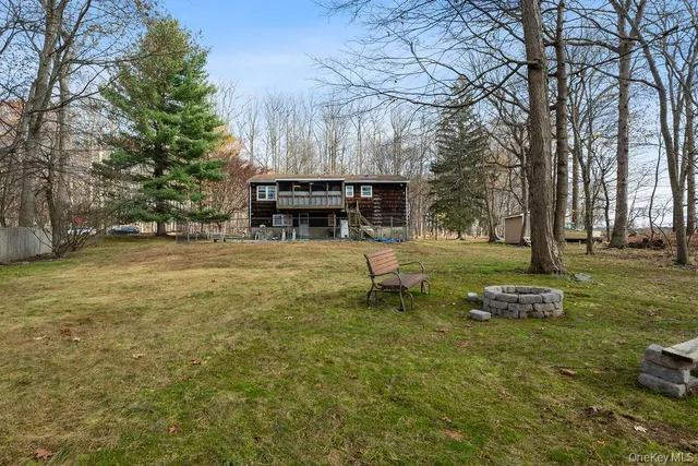 view of a house with a yard
