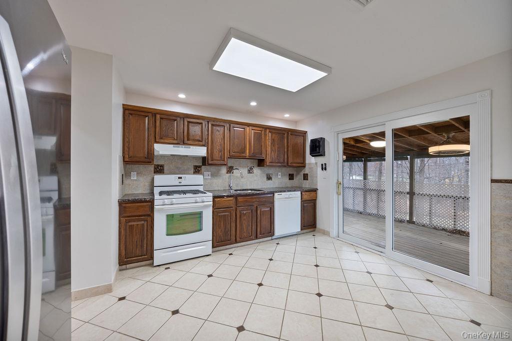 9 New Ackertown Road Monsey, NY 10952 - Photo 10 of 37 a kitchen with a cabinets and appliances