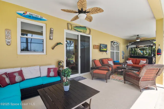 a living room with furniture and a table