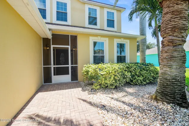 a view of a garden with pathway